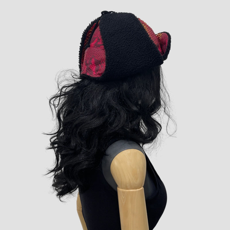 Python leather trapper hat