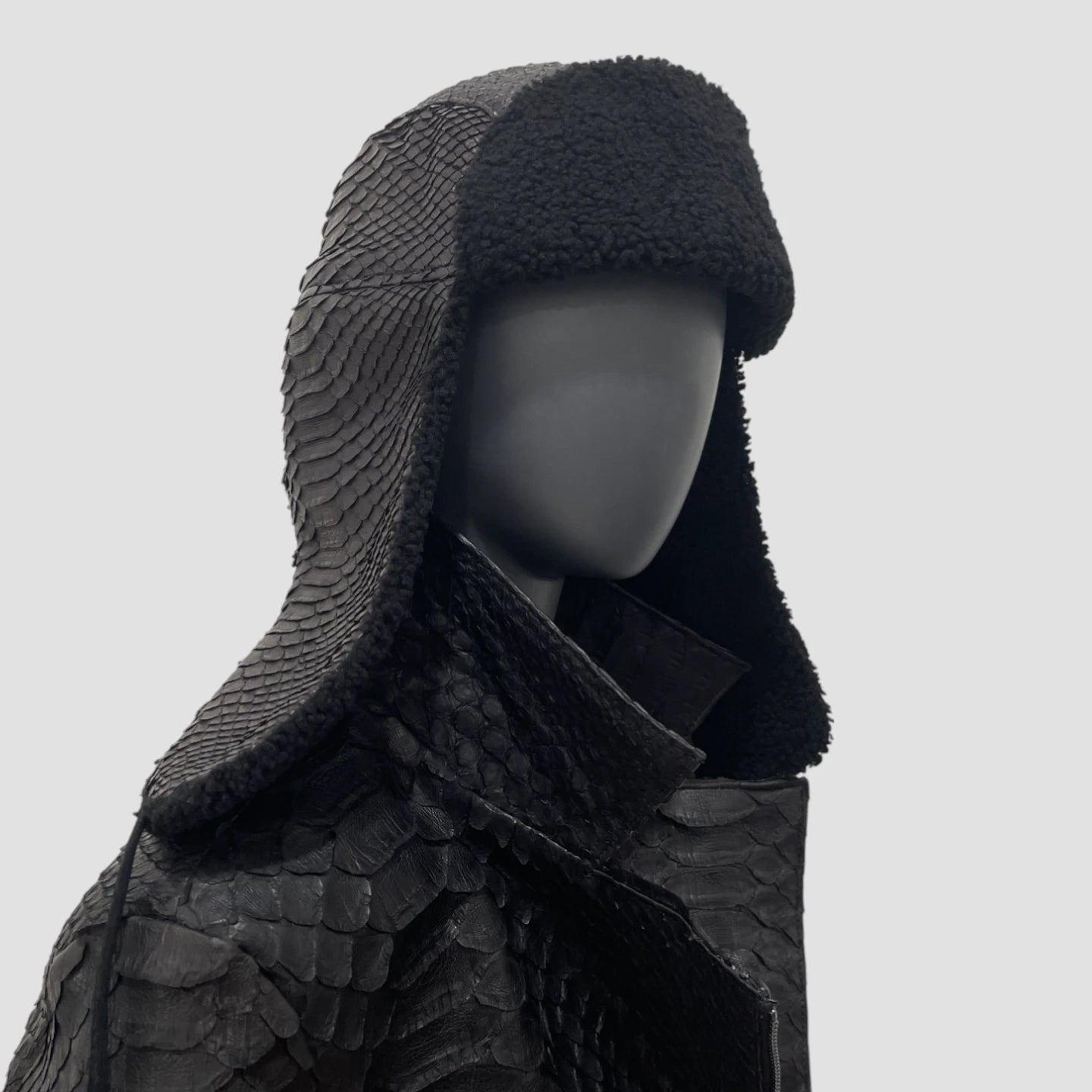 Python leather trapper hat