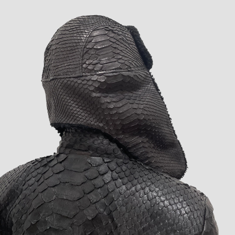 Python leather trapper hat